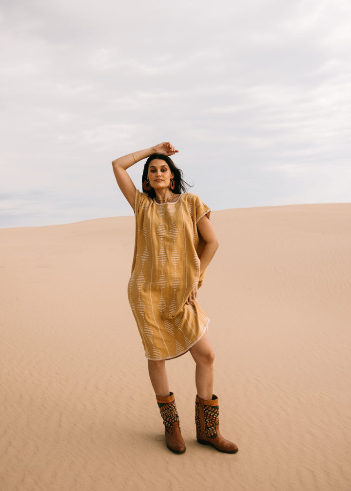 Artisanal honey-toned Frida Kaftan in breathable linen, designed for effortless resortwear by Ulu Lounge."