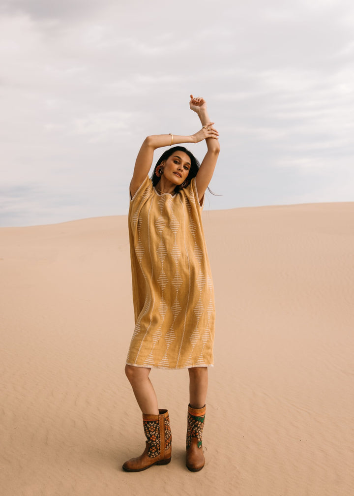 Artisanal honey-toned Frida Kaftan in breathable linen, designed for effortless resortwear by Ulu Lounge."