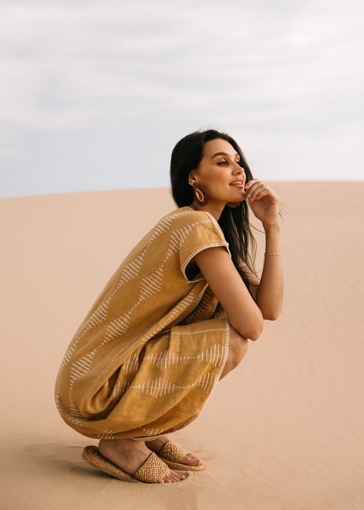 Artisanal honey-toned Frida Kaftan in breathable linen, designed for effortless resortwear by Ulu Lounge."