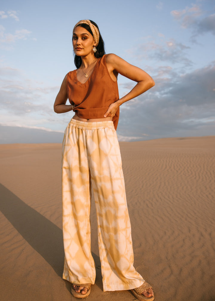 Relaxed fit biscotti shibori pants, handmade from eco-friendly Tencel fabric, perfect for resortwear