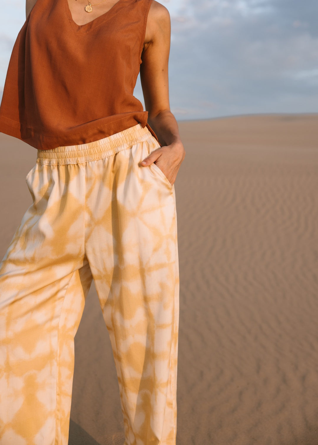 Relaxed fit biscotti shibori pants, handmade from eco-friendly Tencel fabric, perfect for resortwear