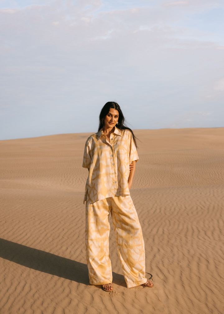 Relaxed fit biscotti shibori pants, handmade from eco-friendly Tencel fabric, perfect for resortwear