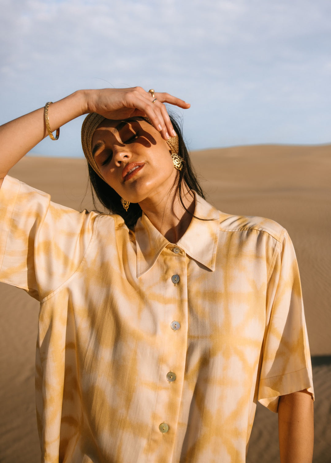 Relaxed fit biscotti shibori shirt made with eco-friendly Tencel fabric, perfect for effortless resort style."