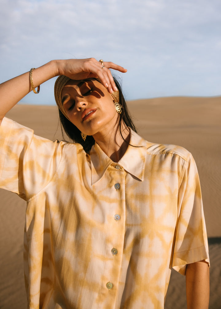 Relaxed fit biscotti shibori shirt made with eco-friendly Tencel fabric, perfect for effortless resort style."