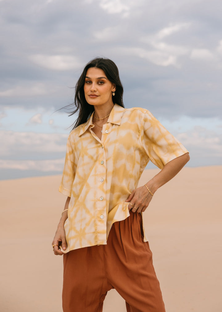 Relaxed fit biscotti shibori shirt made with eco-friendly Tencel fabric, perfect for effortless resort style."