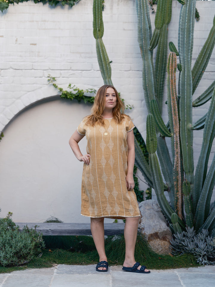 Artisanal honey-toned Frida Kaftan in breathable linen, designed for effortless resortwear by Ulu Lounge."